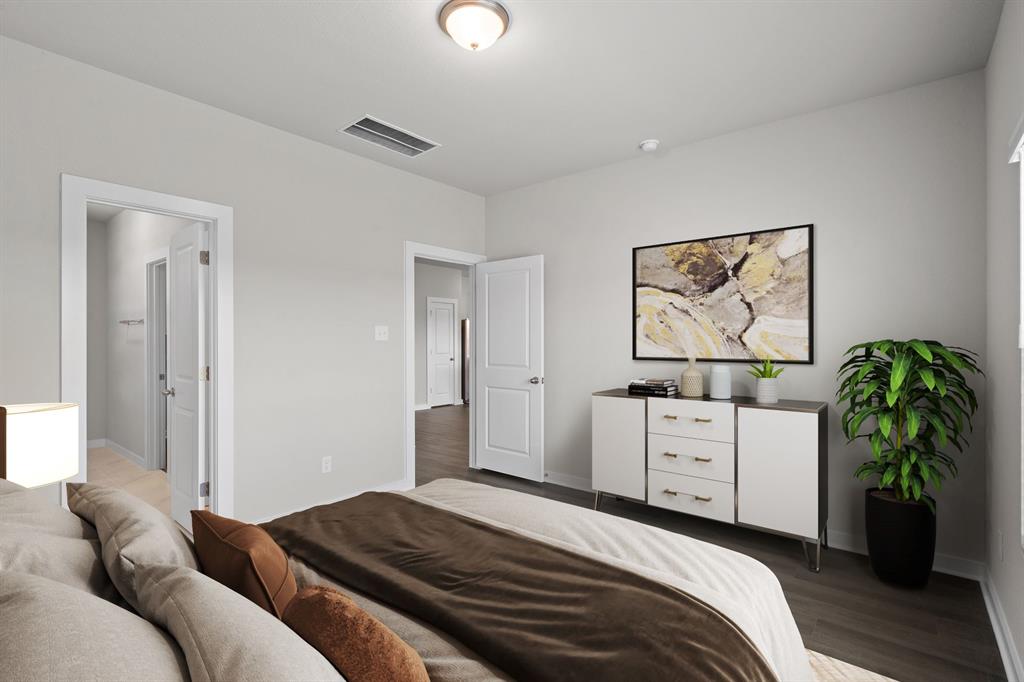 177 Sleep Hollow Jarrell, TX 76537 - Photo 5 of 24 Spacious interior room featuring light-toned walls, wood-finish flooring, white trim, and a semi-flush ceiling light fixture