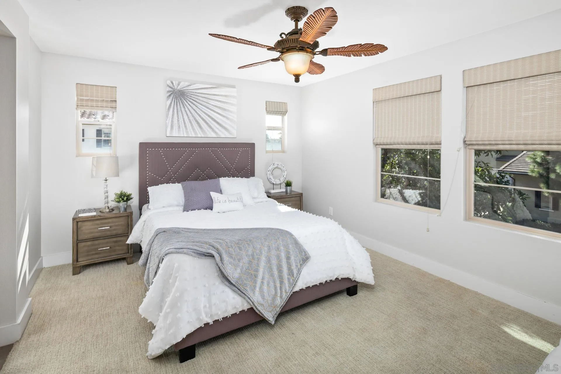 1676 Shorebreak Way Encinitas, CA 92024 - Photo 13 of 62 a bedroom with a bed chandelier and a window