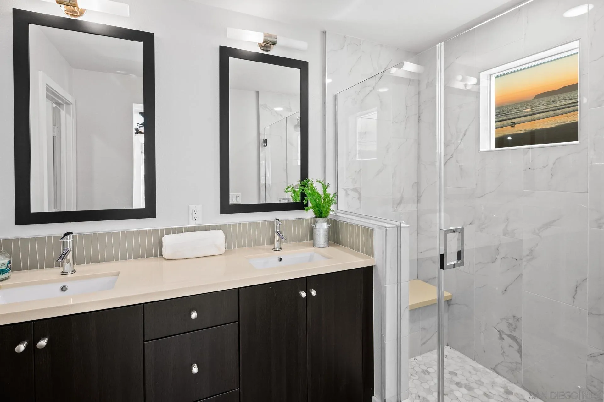 1676 Shorebreak Way Encinitas, CA 92024 - Photo 18 of 62 a bathroom with a double vanity sink mirror and double