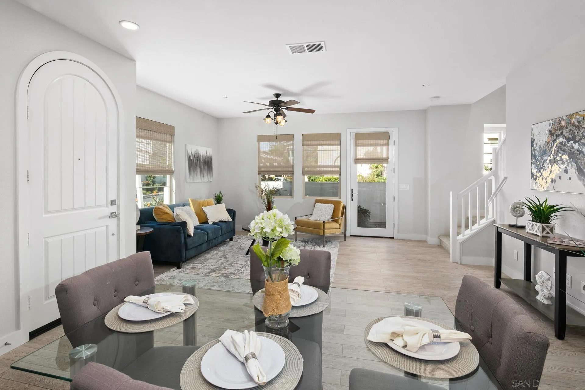 1676 Shorebreak Way Encinitas, CA 92024 - Photo 2 of 62 a living room with furniture and a table