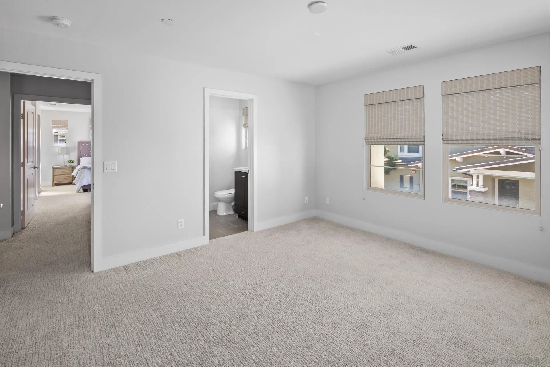 1676 Shorebreak Way Encinitas, CA 92024 - Photo 26 of 62 a view of an empty room with a window