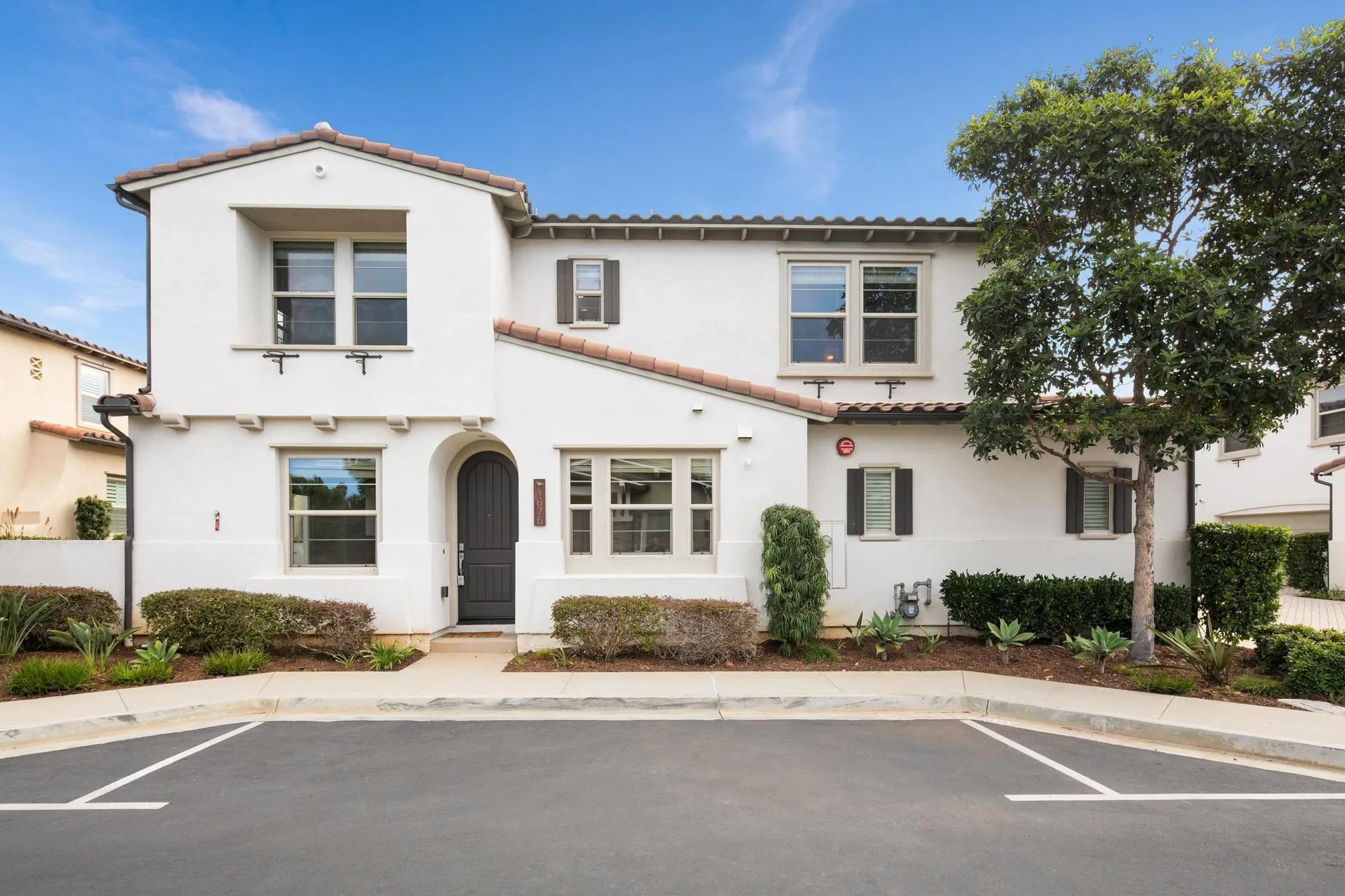 1676 Shorebreak Way Encinitas, CA 92024 - Photo 32 of 62 front view of a house with a yard