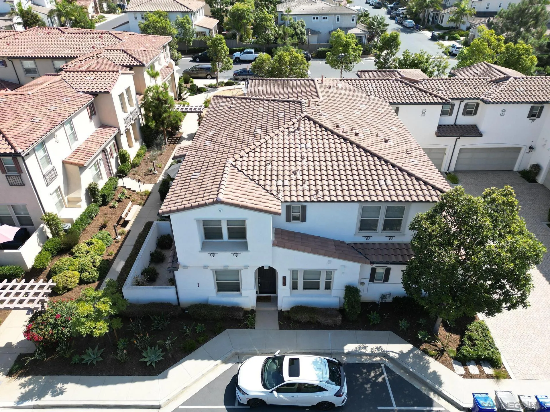 1676 Shorebreak Way Encinitas, CA 92024 - Photo 33 of 62 a front view of house with yard