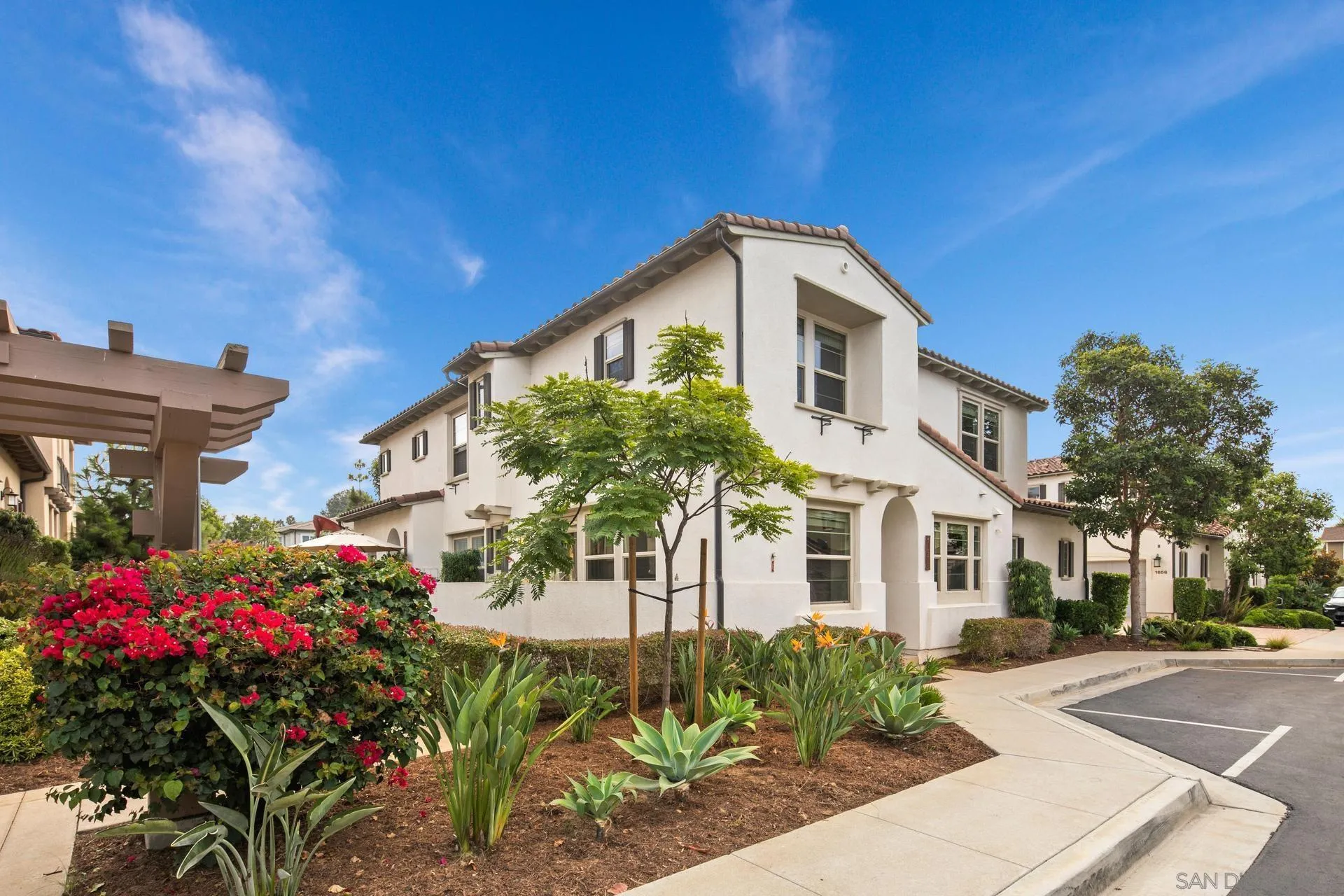 1676 Shorebreak Way Encinitas, CA 92024 - Photo 34 of 62 a front view of a house with a yard