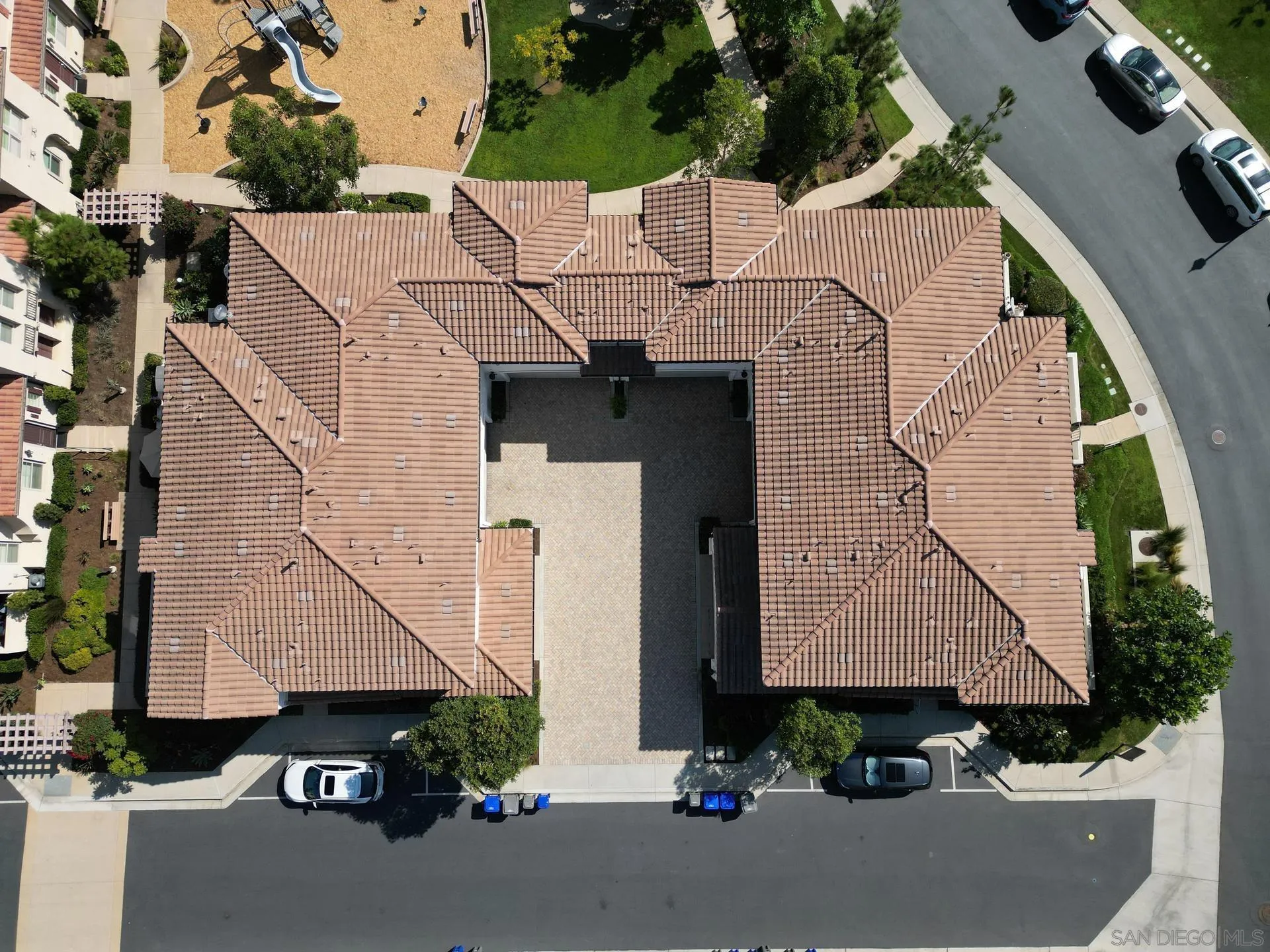 1676 Shorebreak Way Encinitas, CA 92024 - Photo 39 of 62 an aerial view of a house with a garden