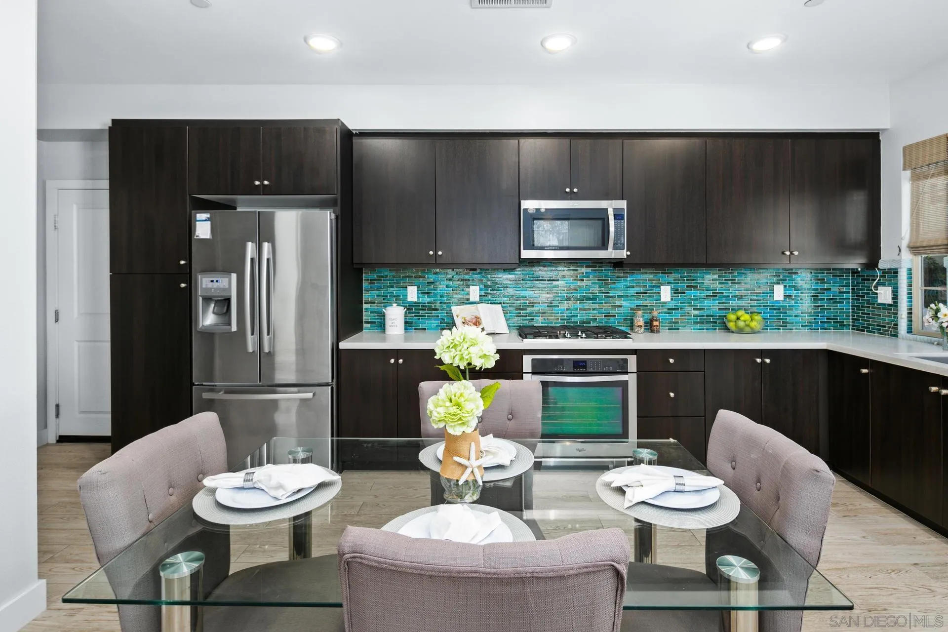 1676 Shorebreak Way Encinitas, CA 92024 - Photo 6 of 62 a living room with furniture and a fireplace