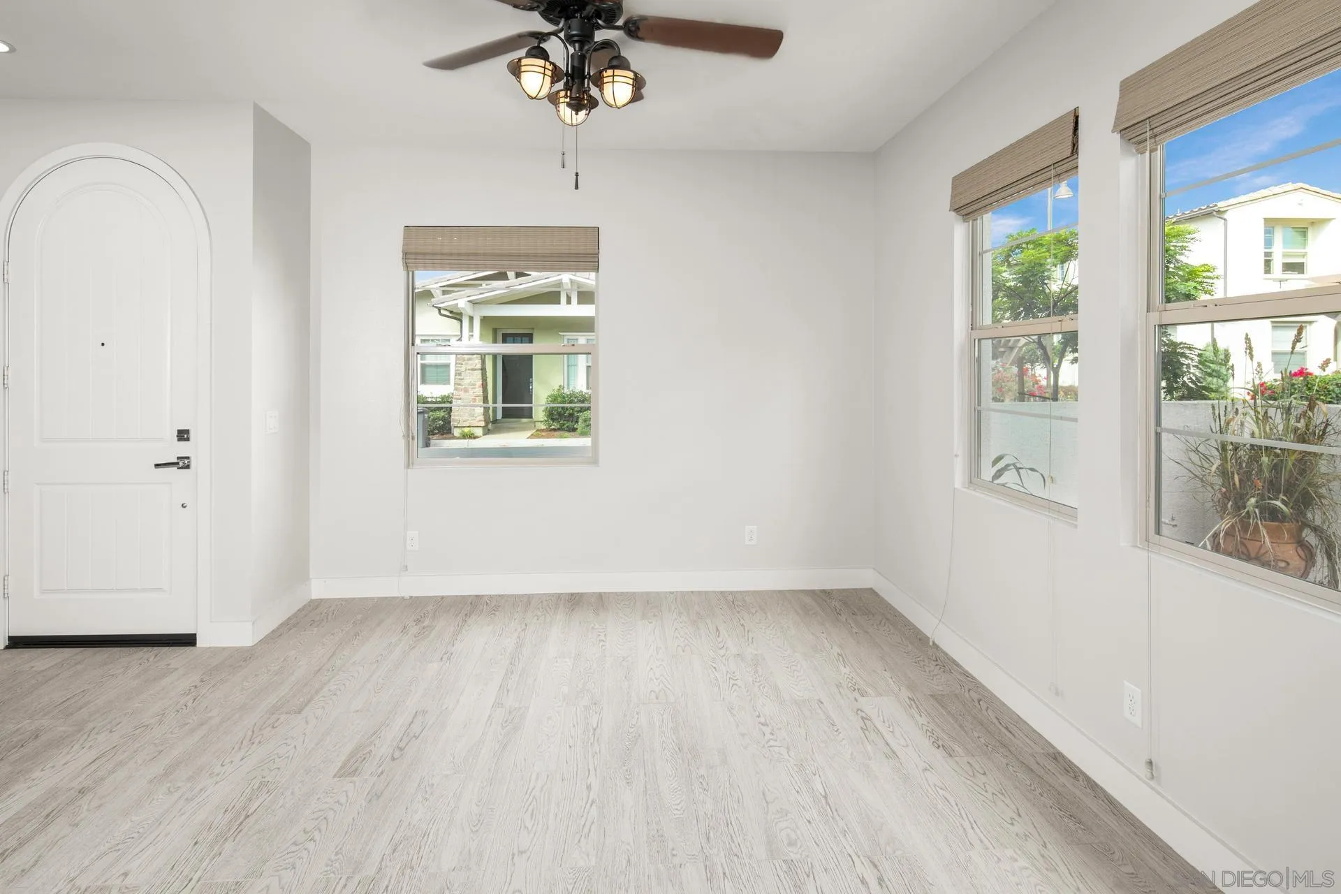 1676 Shorebreak Way Encinitas, CA 92024 - Photo 62 of 62 wooden floor in an empty room with a window