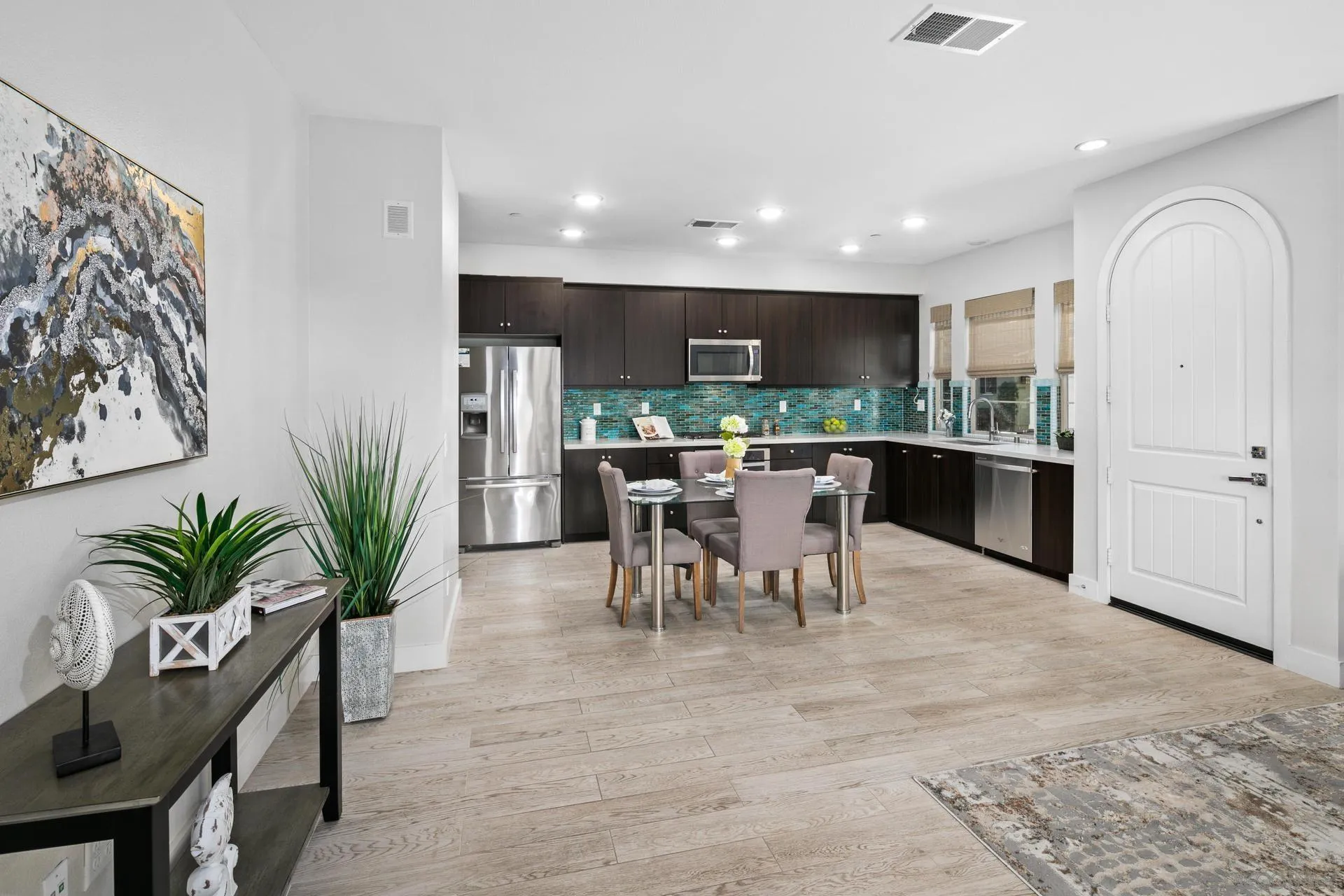 1676 Shorebreak Way Encinitas, CA 92024 - Photo 9 of 62 a view of a dining room with furniture