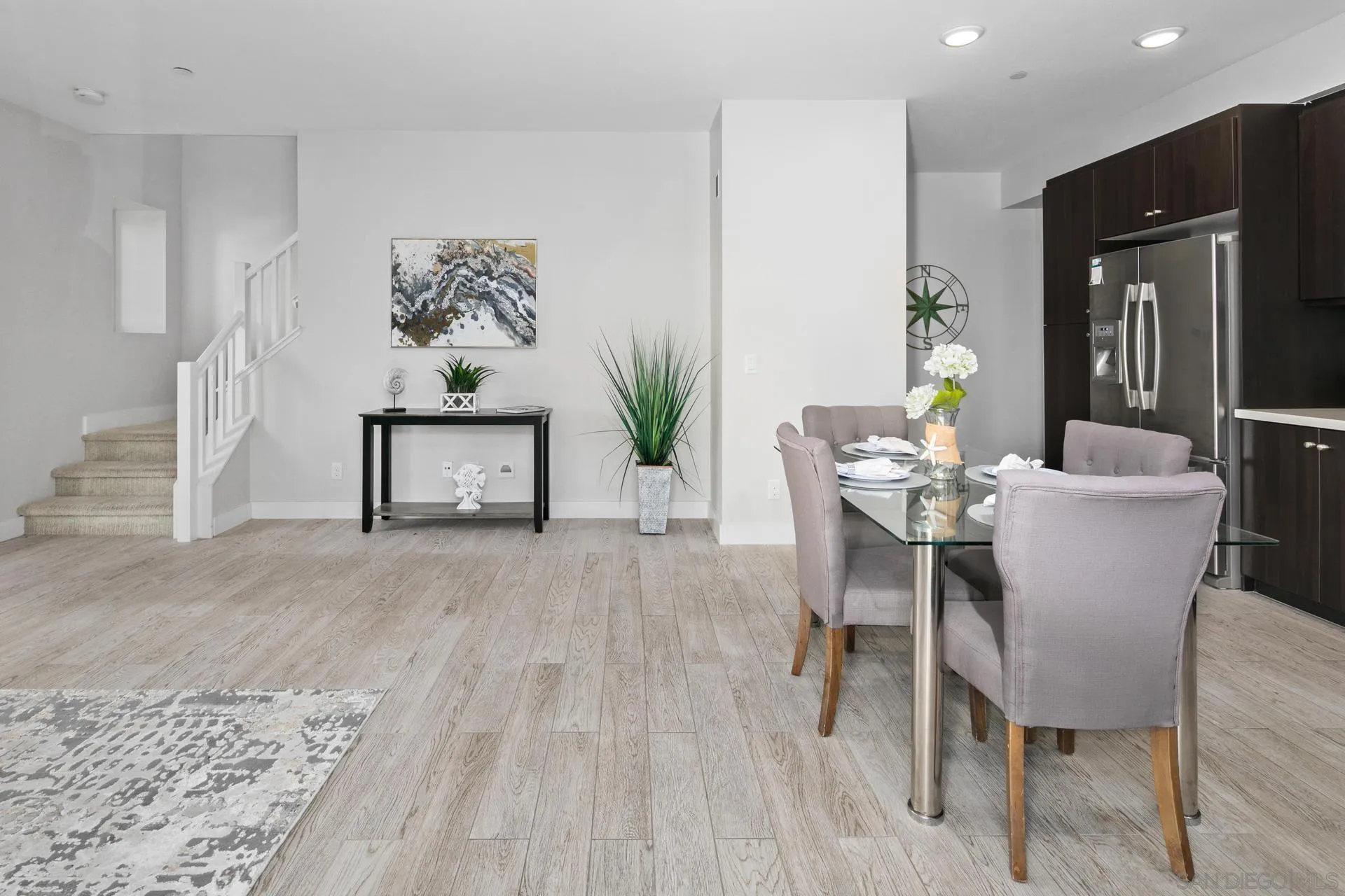 1676 Shorebreak Way Encinitas, CA 92024 - Photo 10 of 62 a view of a dining room with furniture