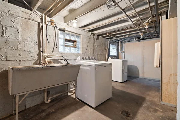 a utility room with dryer and washer