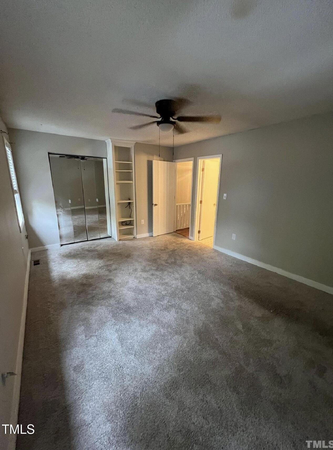 10 Willow Bridge Drive Durham, NC 27707 - Photo 11 of 16 a view of an empty room with a window