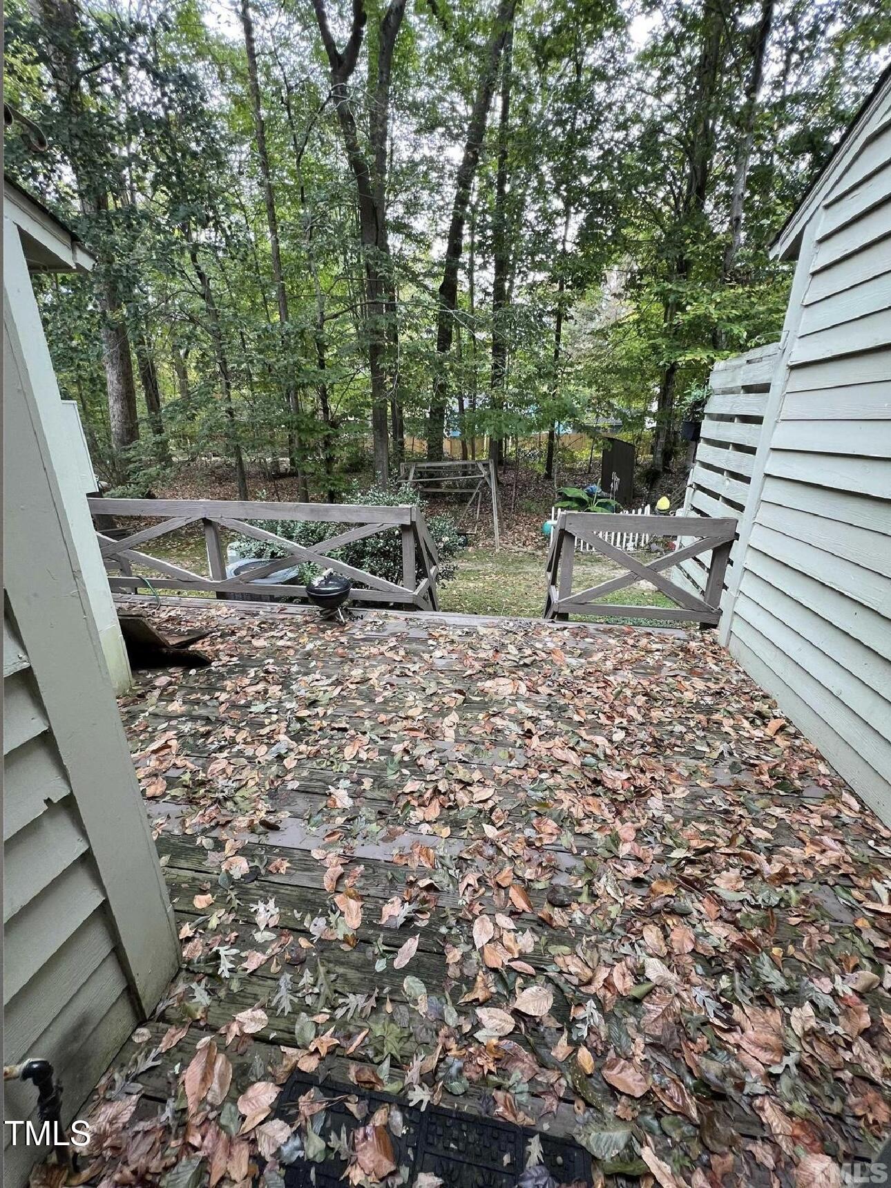10 Willow Bridge Drive Durham, NC 27707 - Photo 15 of 16 a backyard of a house with lots of green space
