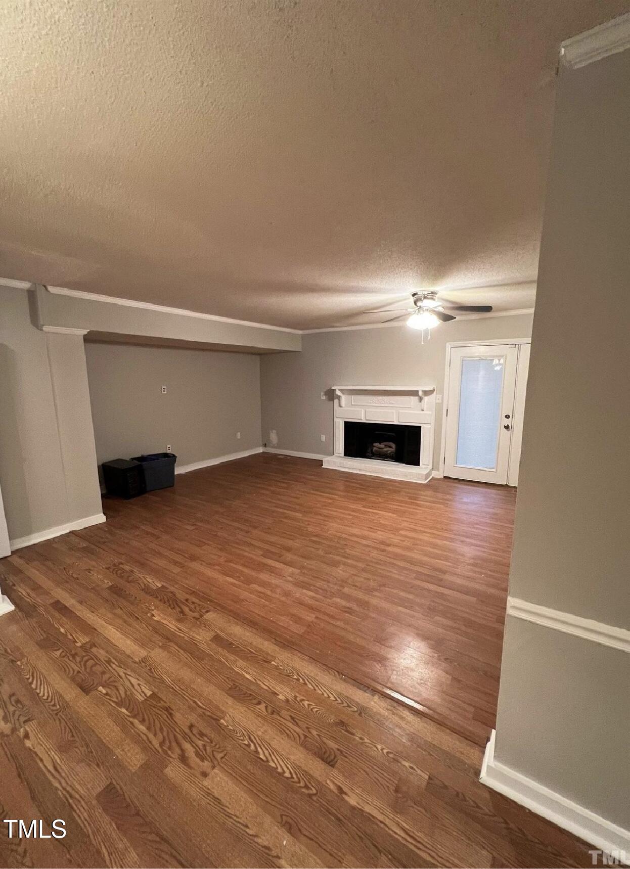 10 Willow Bridge Drive Durham, NC 27707 - Photo 7 of 16 a view of empty room with wooden floor