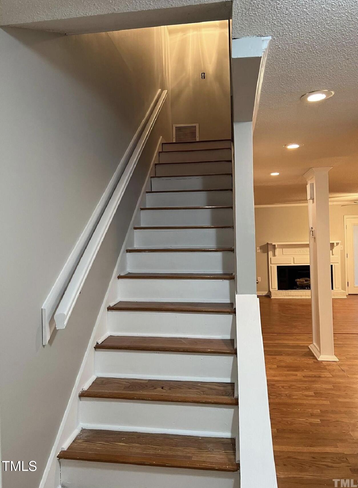 10 Willow Bridge Drive Durham, NC 27707 - Photo 9 of 16 a view of entryway and hall with wooden floor