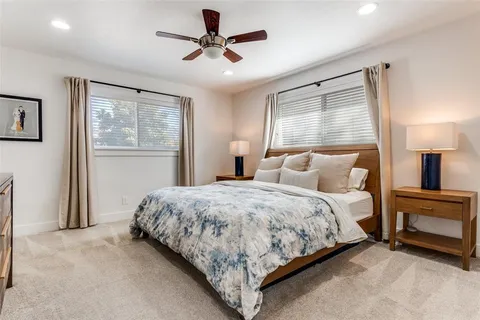 a bathroom with a double vanity sink a and a shower