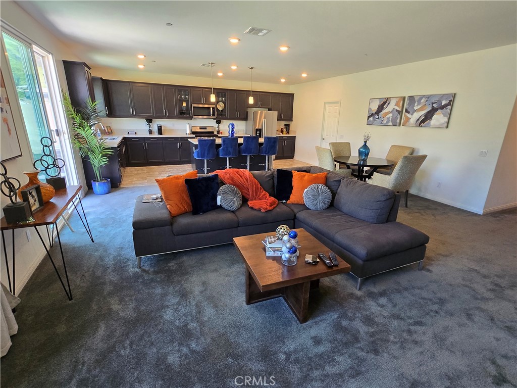 7900 Raincross Court Riverside, CA 92507 - Photo 18 of 21 a living room with furniture and kitchen view