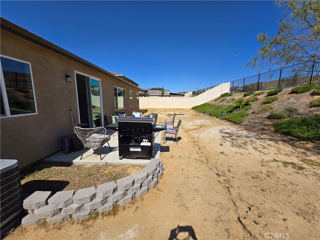 7900 Raincross Court Riverside, CA 92507 - Photo 20 of 21 a view of a backyard with sitting area