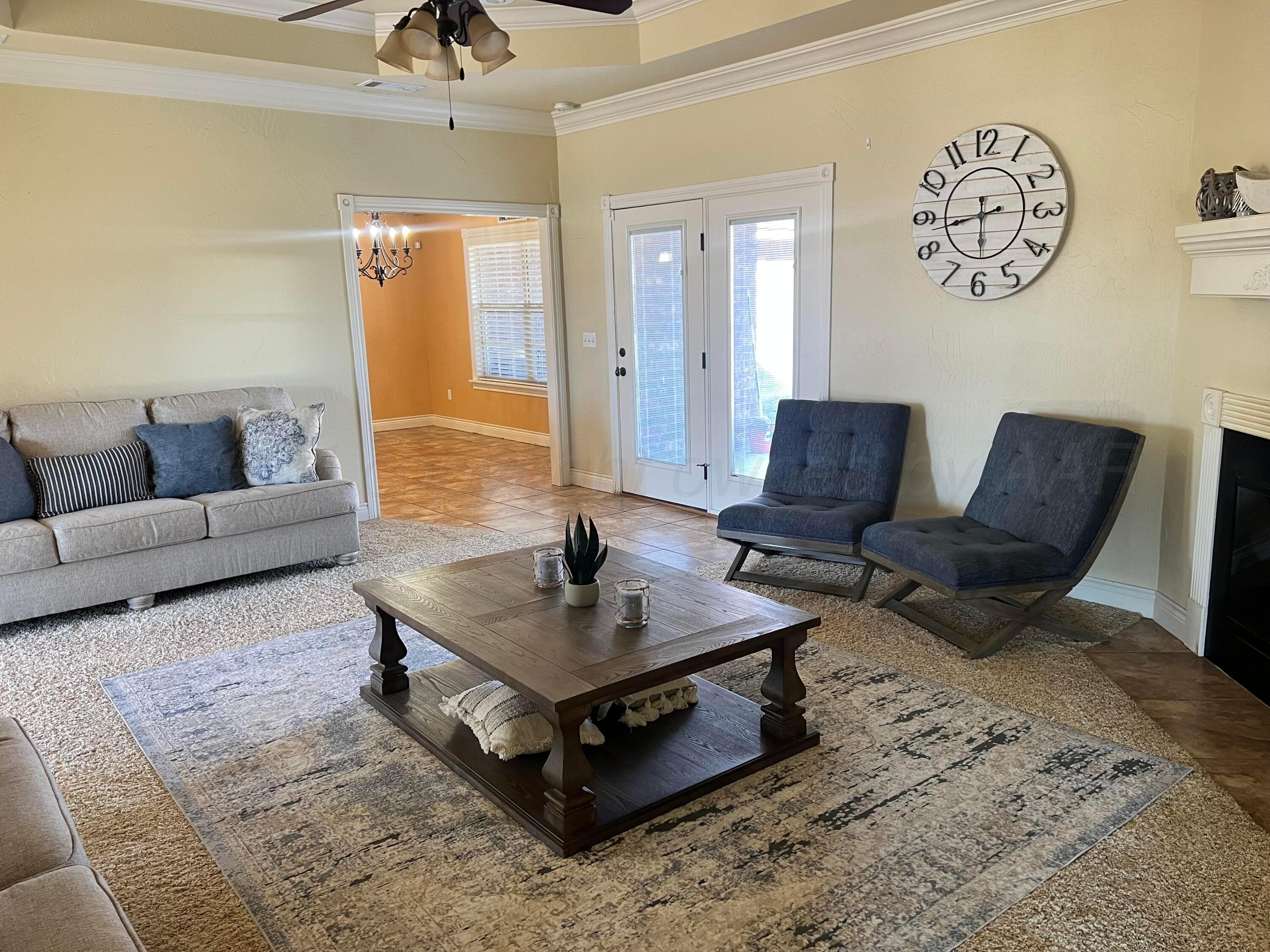 830 Baltimore Drive Hereford, TX 79045 - Photo 15 of 46 a living room with furniture and a rug