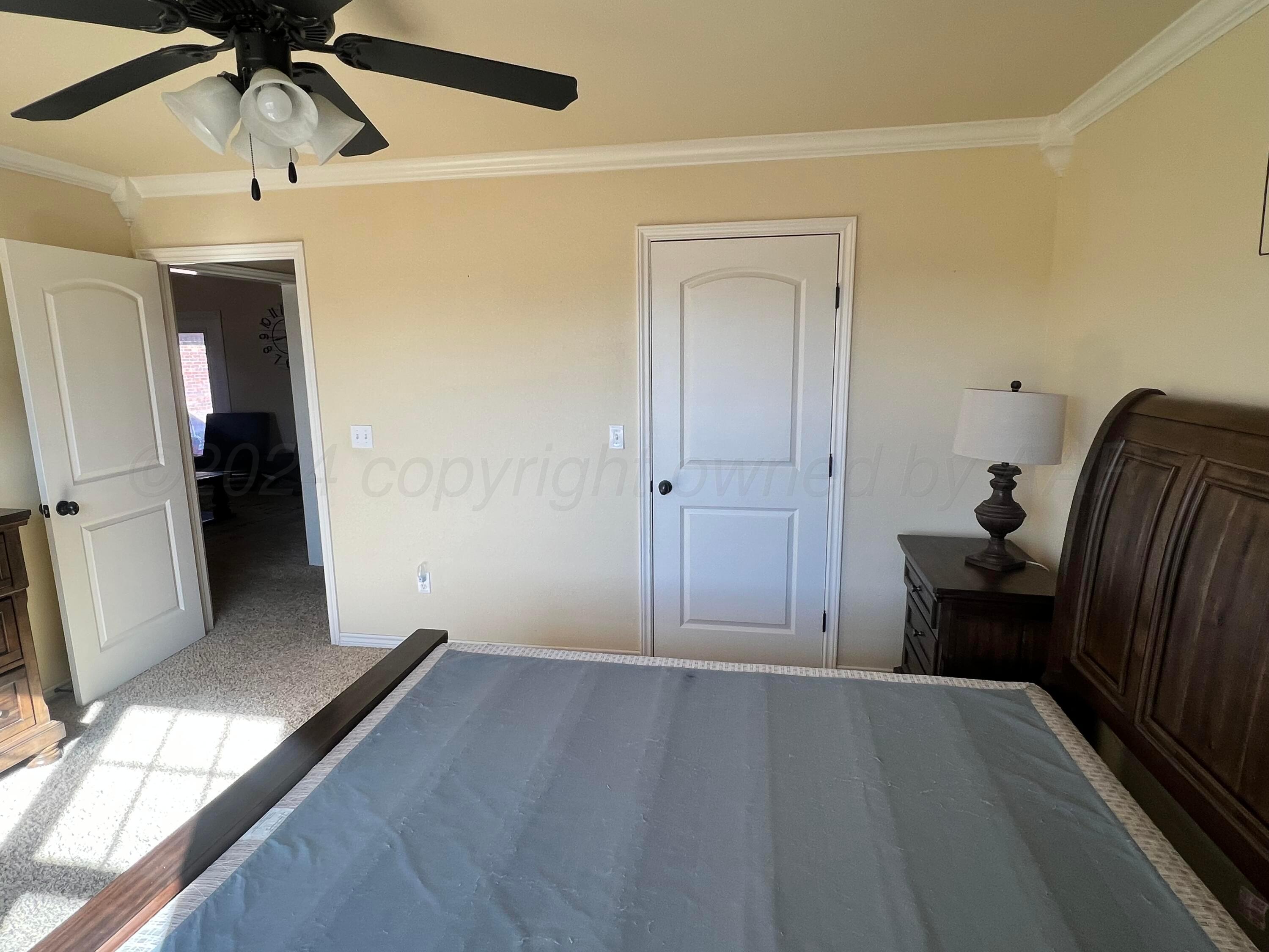 830 Baltimore Drive Hereford, TX 79045 - Photo 36 of 46 a view of a hallway with wooden floor and staircase