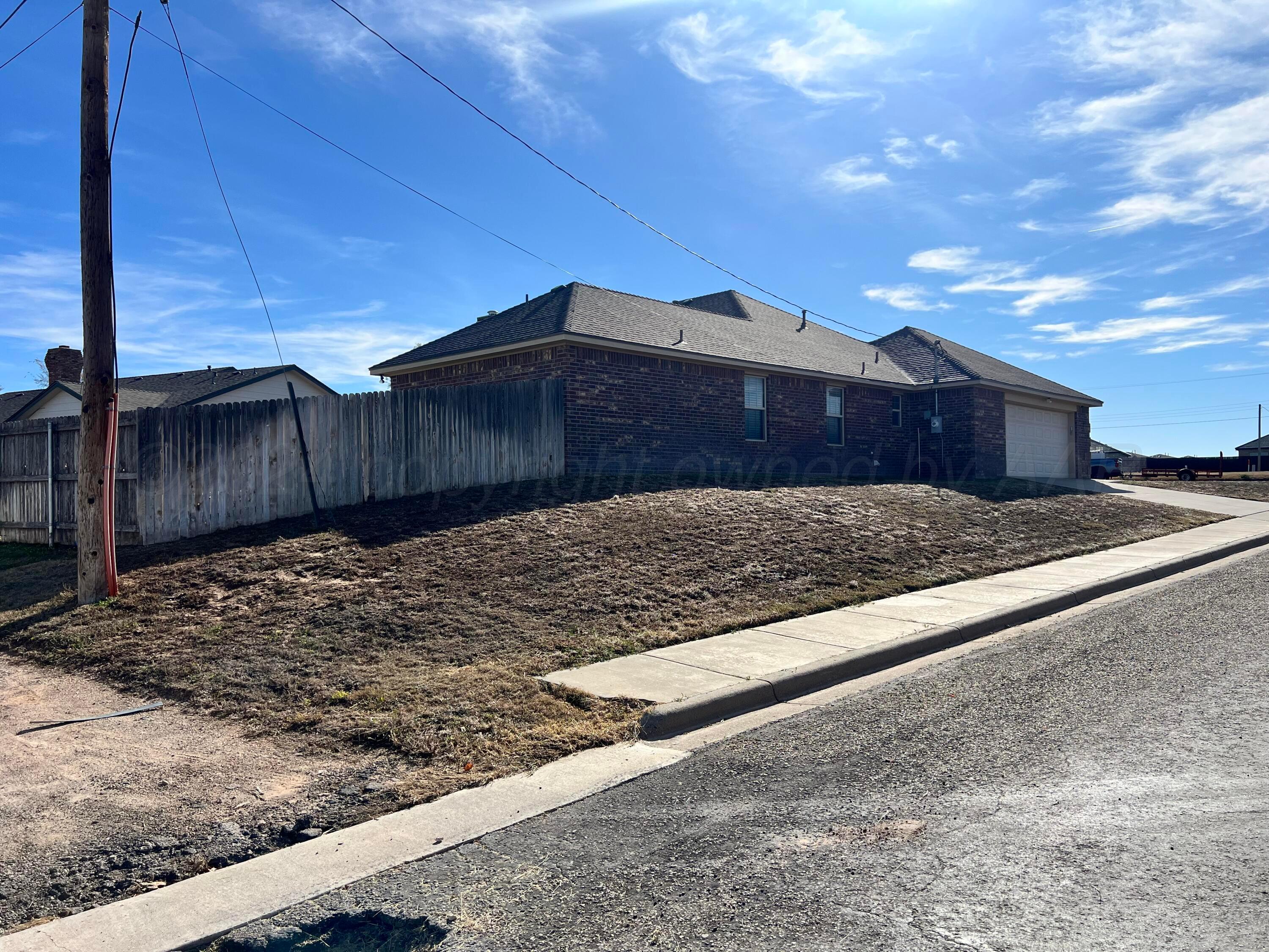 830 Baltimore Drive Hereford, TX 79045 - Photo 4 of 46 a view of a backyard of the house