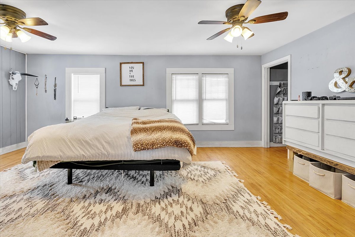 21626 Oak Grove Road Harvard, IL 60033 - Photo 11 of 34 a living room with a bed and furniture