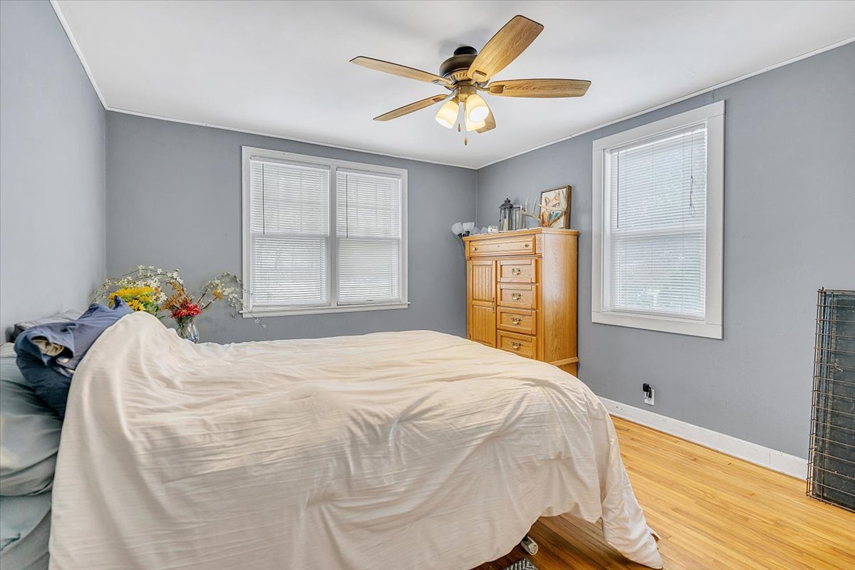 21626 Oak Grove Road Harvard, IL 60033 - Photo 13 of 34 a bedroom with a bed and a window