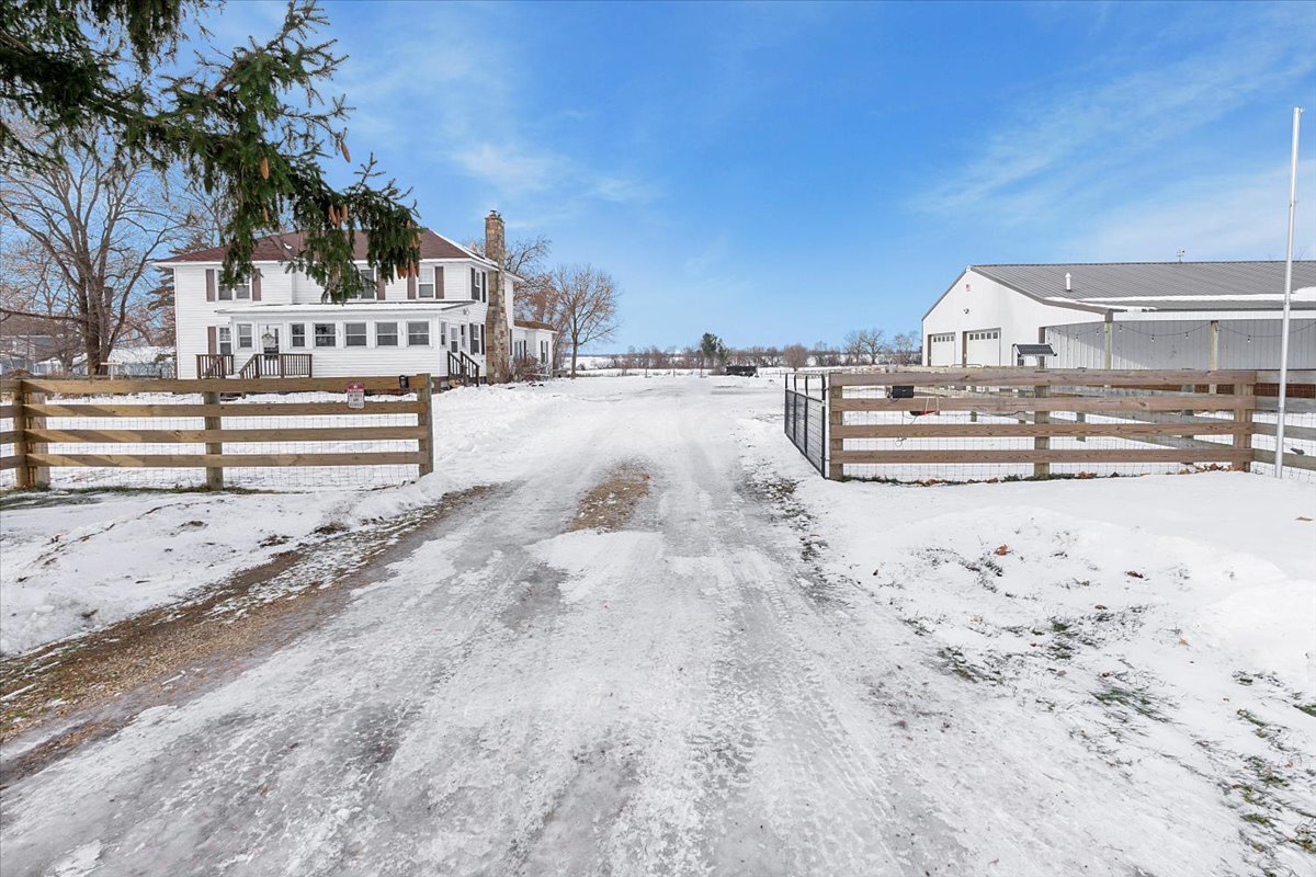 21626 Oak Grove Road Harvard, IL 60033 - Photo 2 of 34 a view of swimming pool with outdoor seating and yard in the back