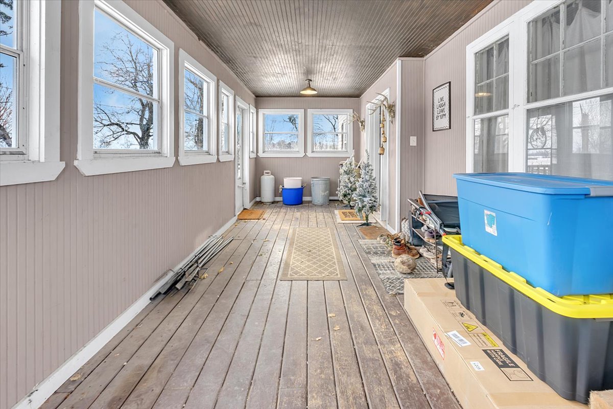 21626 Oak Grove Road Harvard, IL 60033 - Photo 29 of 34 a view of a house with wooden floor and furniture