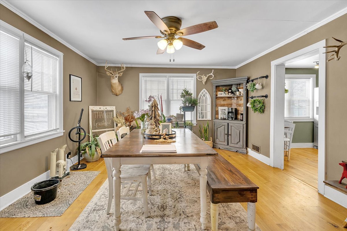 21626 Oak Grove Road Harvard, IL 60033 - Photo 5 of 34 a living room with furniture and a large window