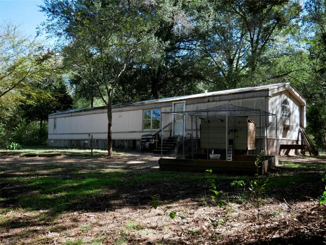 a view of a hallway view with staircase