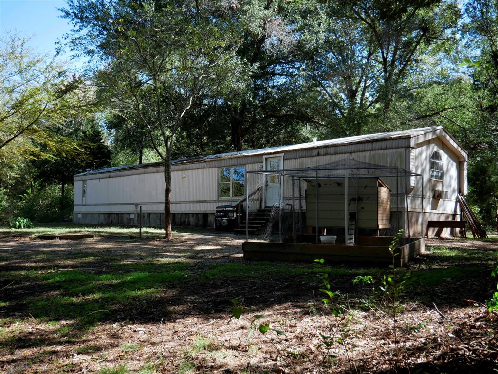 9948 Richardson Road Athens, TX 75752 - Photo 12 of 24 a front view of a house with a yard