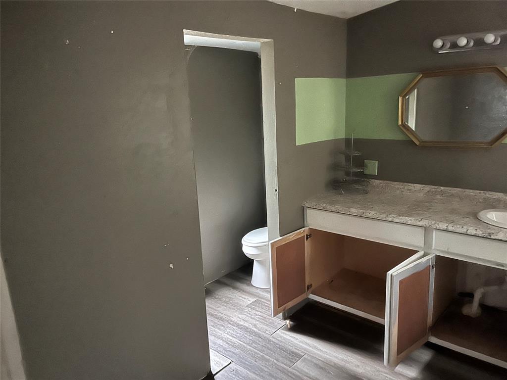 9948 Richardson Road Athens, TX 75752 - Photo 17 of 24 a living room with furniture and a wooden floor