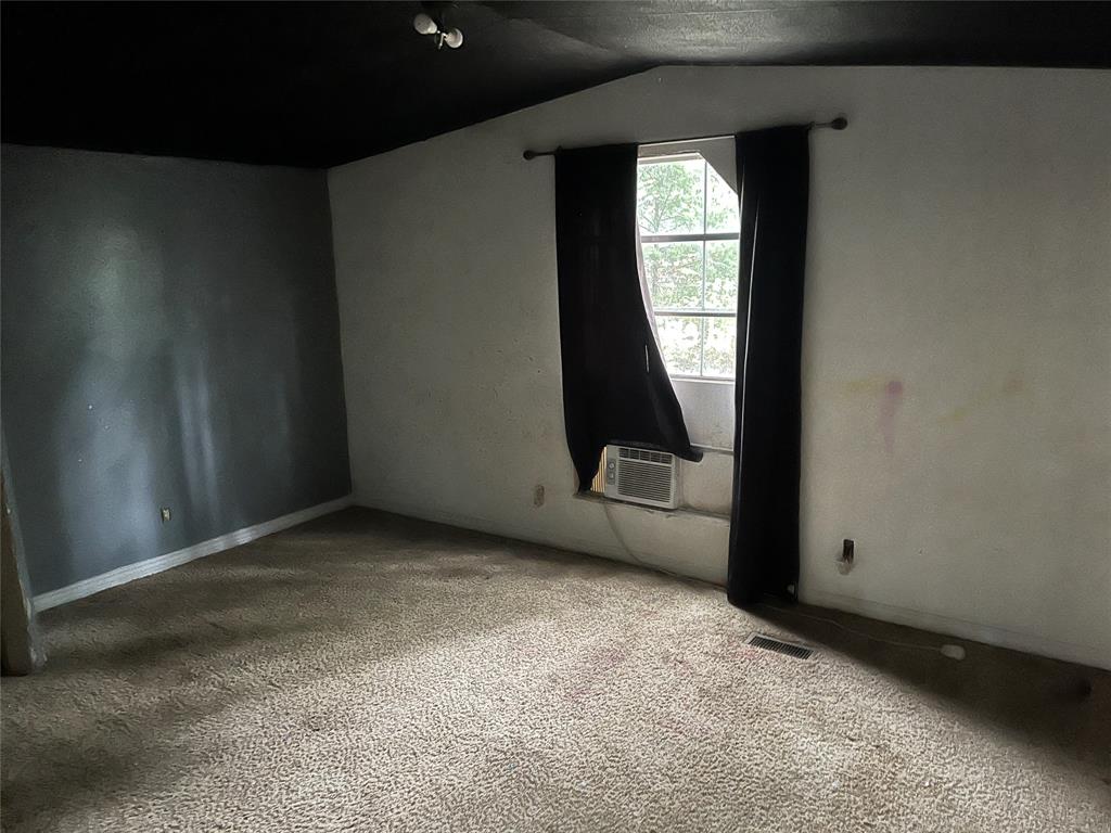 9948 Richardson Road Athens, TX 75752 - Photo 19 of 24 a view of a livingroom with wooden floor and window