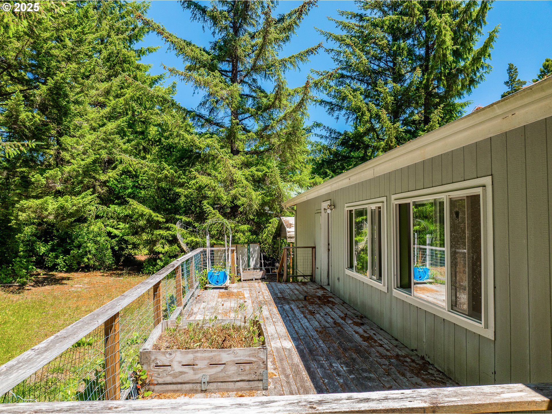 58897 Constance Drive Bandon, OR 97411 - Photo 23 of 37 a view of balcony with deck