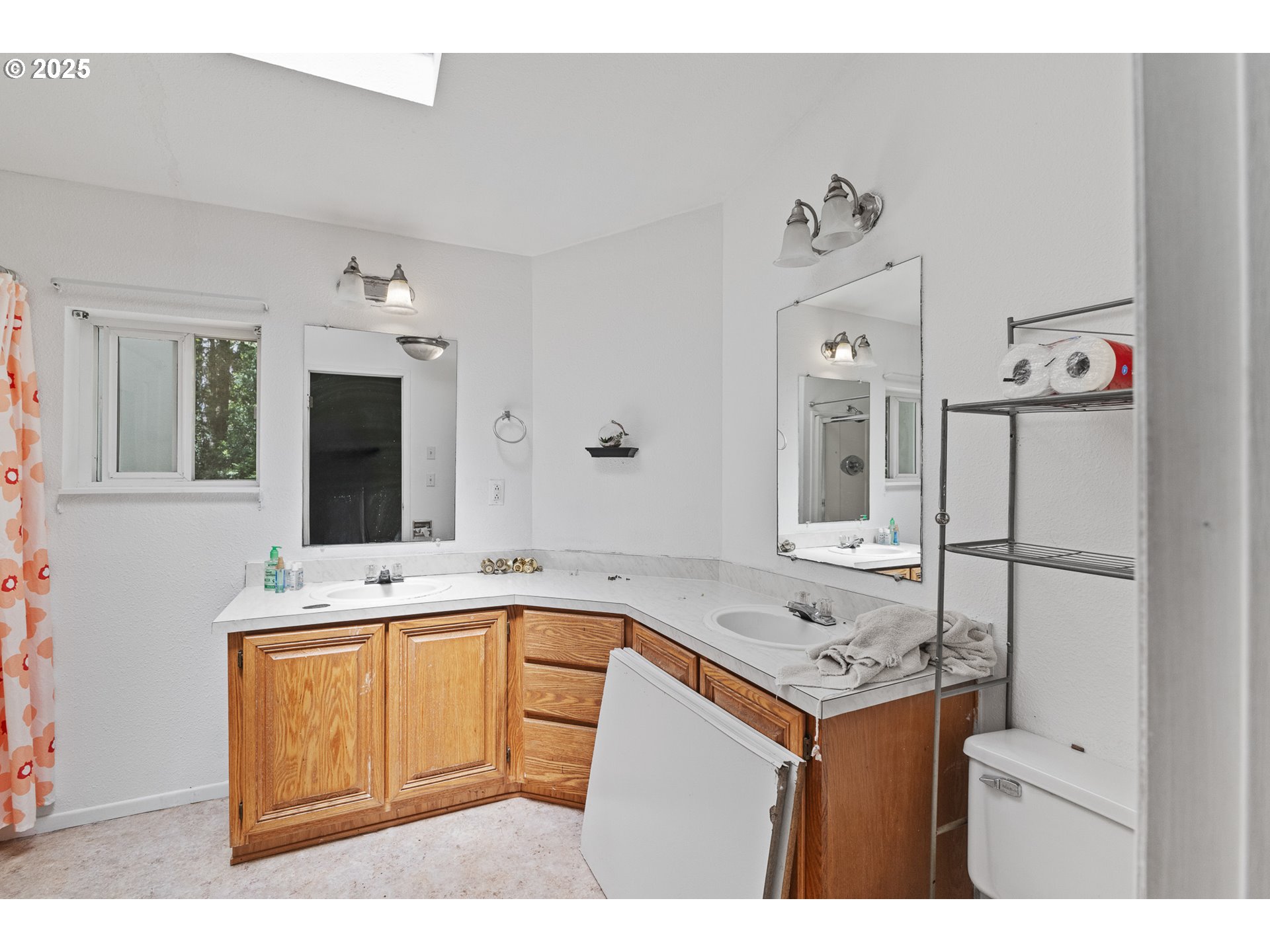 58897 Constance Drive Bandon, OR 97411 - Photo 10 of 37 a bathroom with a sink double vanity granite and a mirror