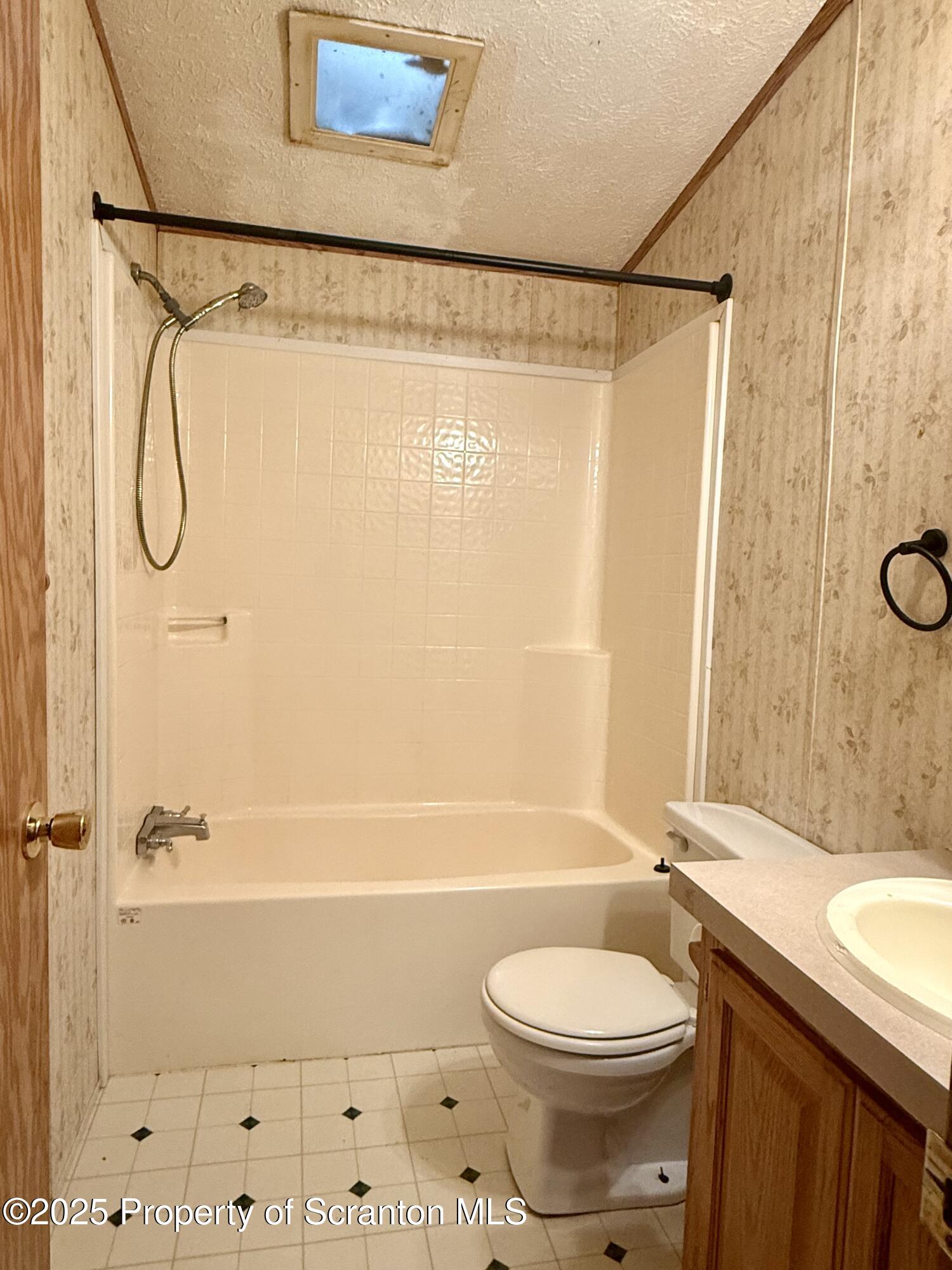 1218 Campsite Road Thompson, PA 18465 - Photo 13 of 26 a bathroom with a toilet a sink and shower