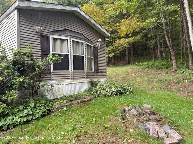 a view of a park with swings and slides