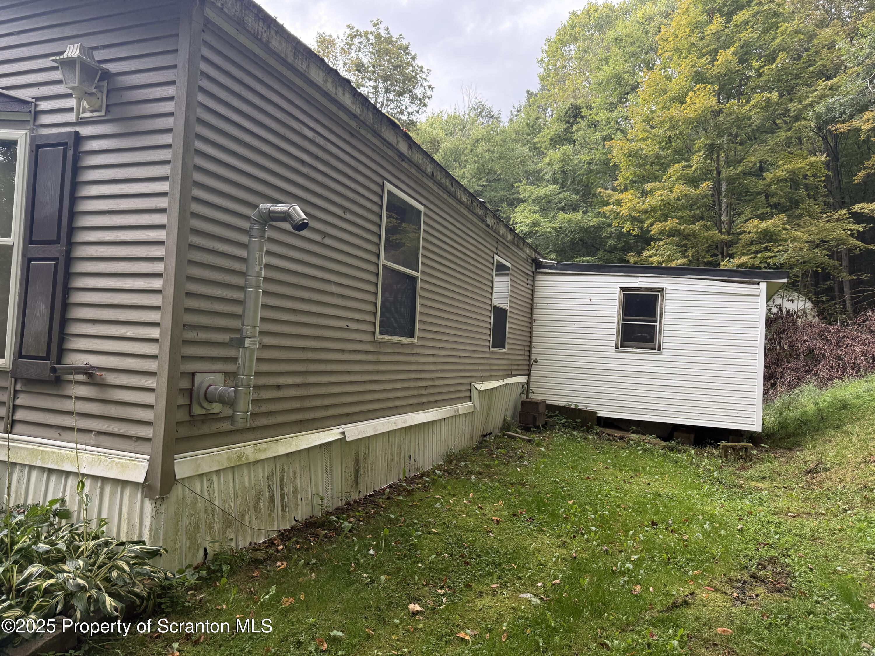1218 Campsite Road Thompson, PA 18465 - Photo 26 of 26 a view of a back yard of the house