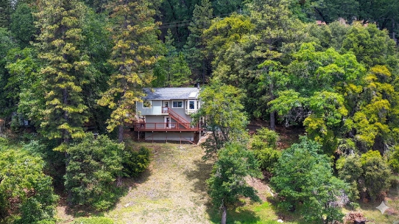4850 8 Mile Road Camino, CA 95709 - Photo 27 of 30 an aerial view of a house with swimming pool and garden