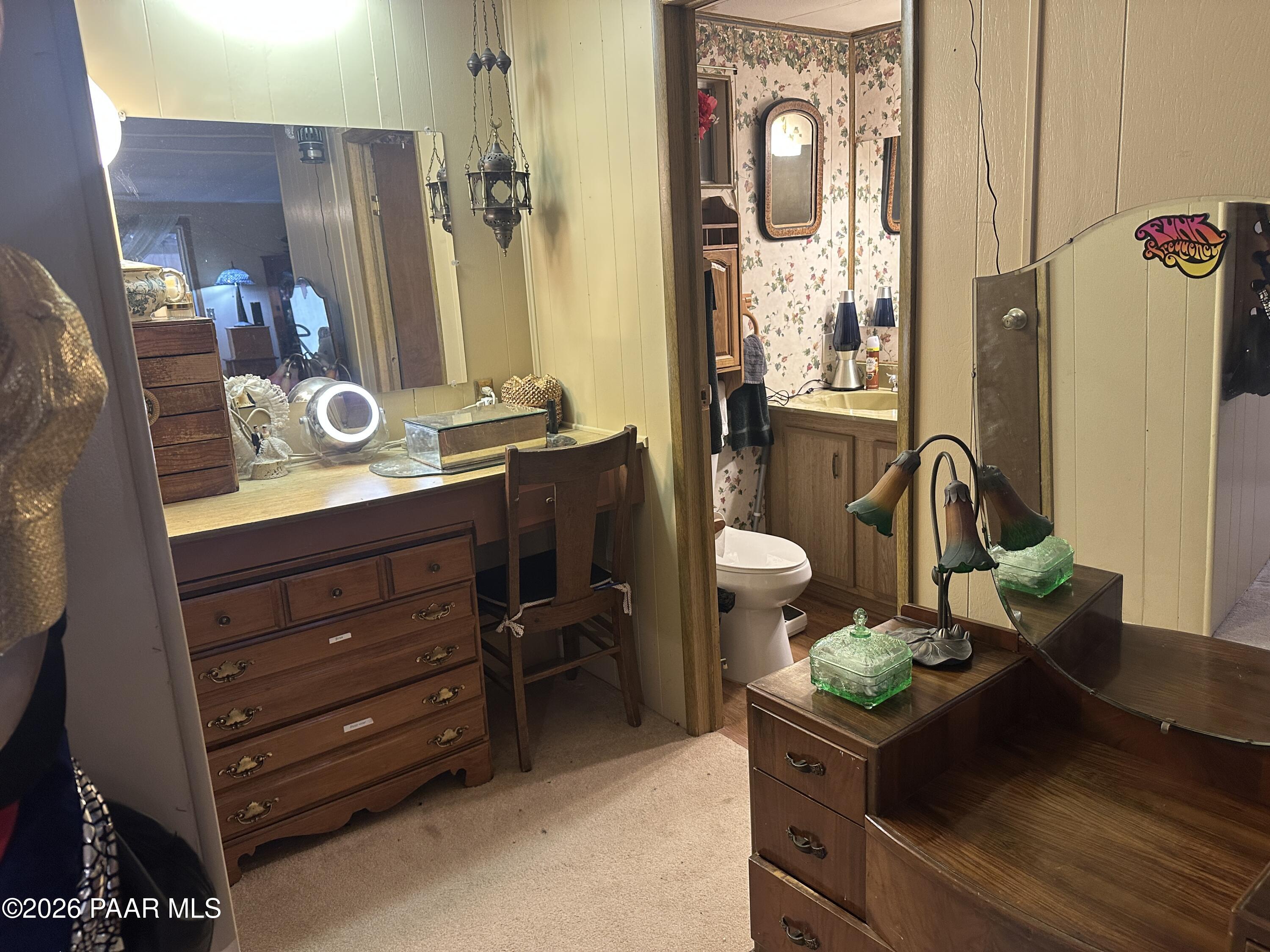 10075 Dapple Grey Trail Dewey, AZ 86327 - Photo 18 of 29 a bathroom with a sink a vanity and a mirror