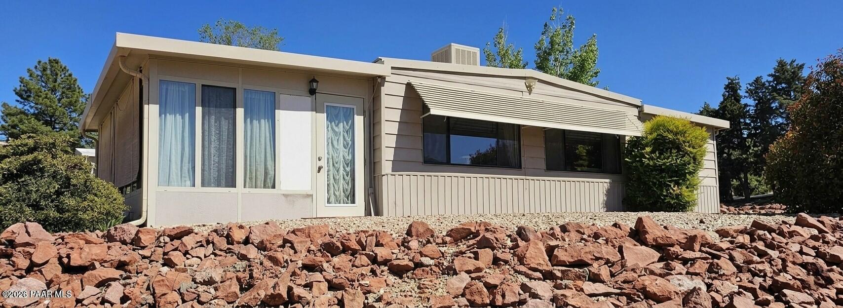 10075 Dapple Grey Trail Dewey, AZ 86327 - Photo 27 of 29 front view of a house with a yard