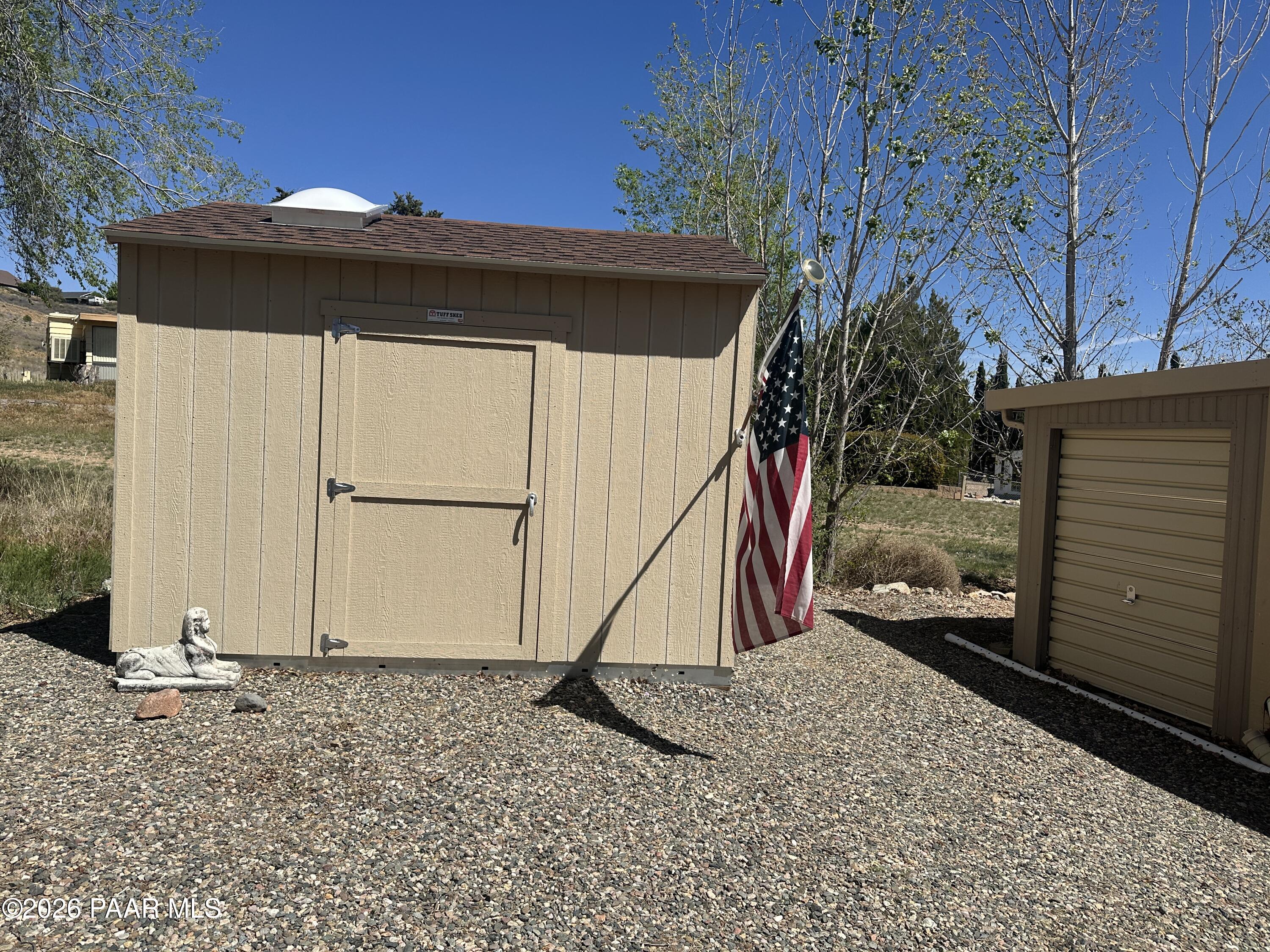 10075 Dapple Grey Trail Dewey, AZ 86327 - Photo 28 of 29 a view of a backyard with a barn