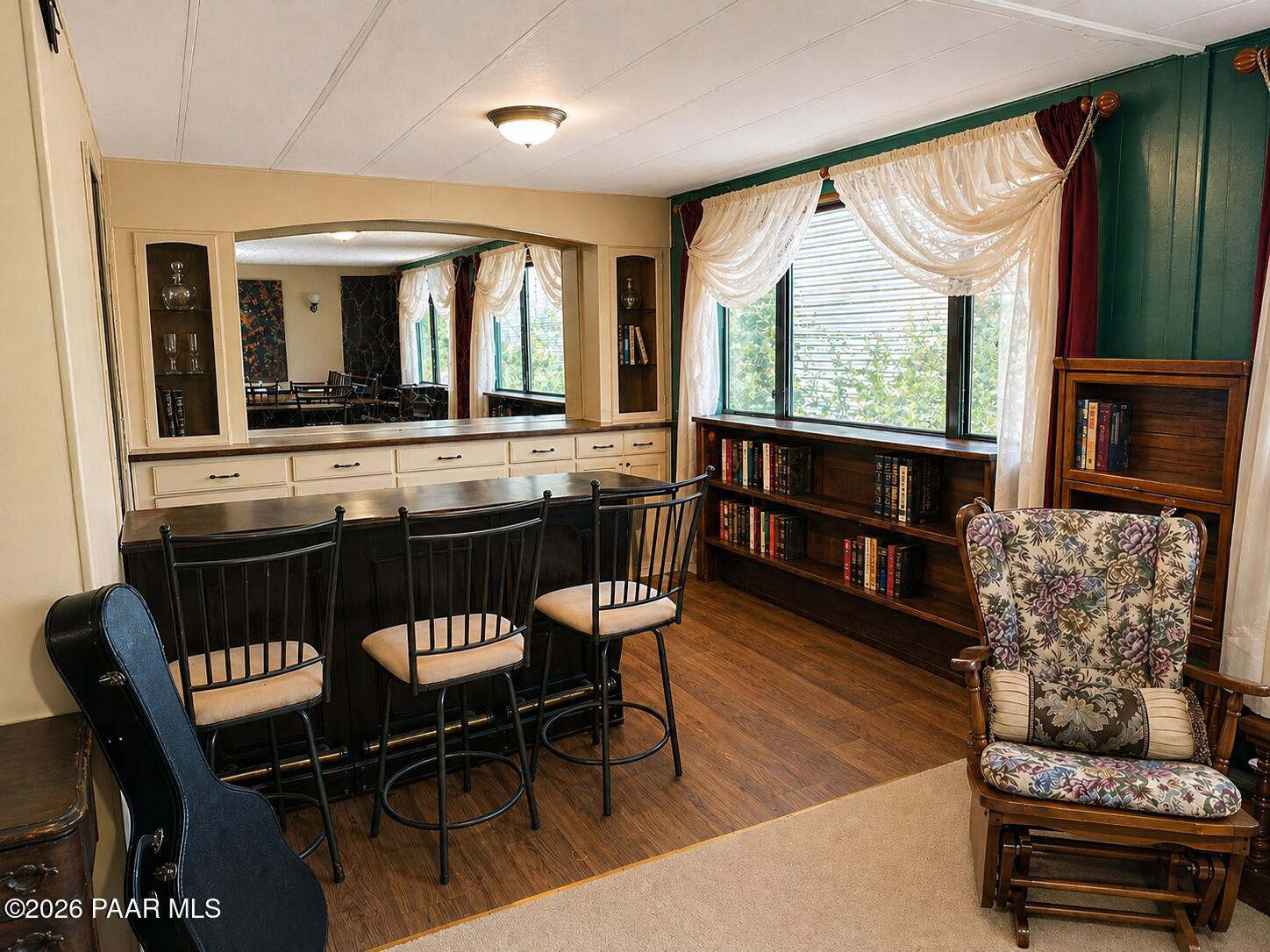 10075 Dapple Grey Trail Dewey, AZ 86327 - Photo 10 of 29 a view of a dining room with furniture window and outside view