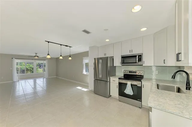 an empty room with windows