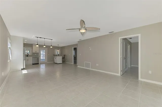 a bathroom with a shower and a sink