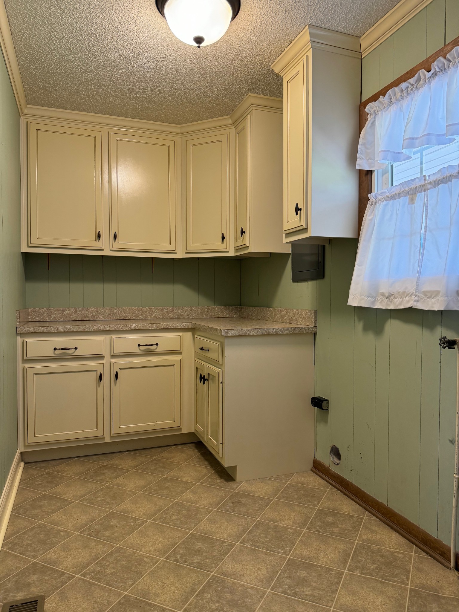 1792 Austin Road Lafayette, TN 37083 - Photo 17 of 34 a view of a kitchen with white cabinets