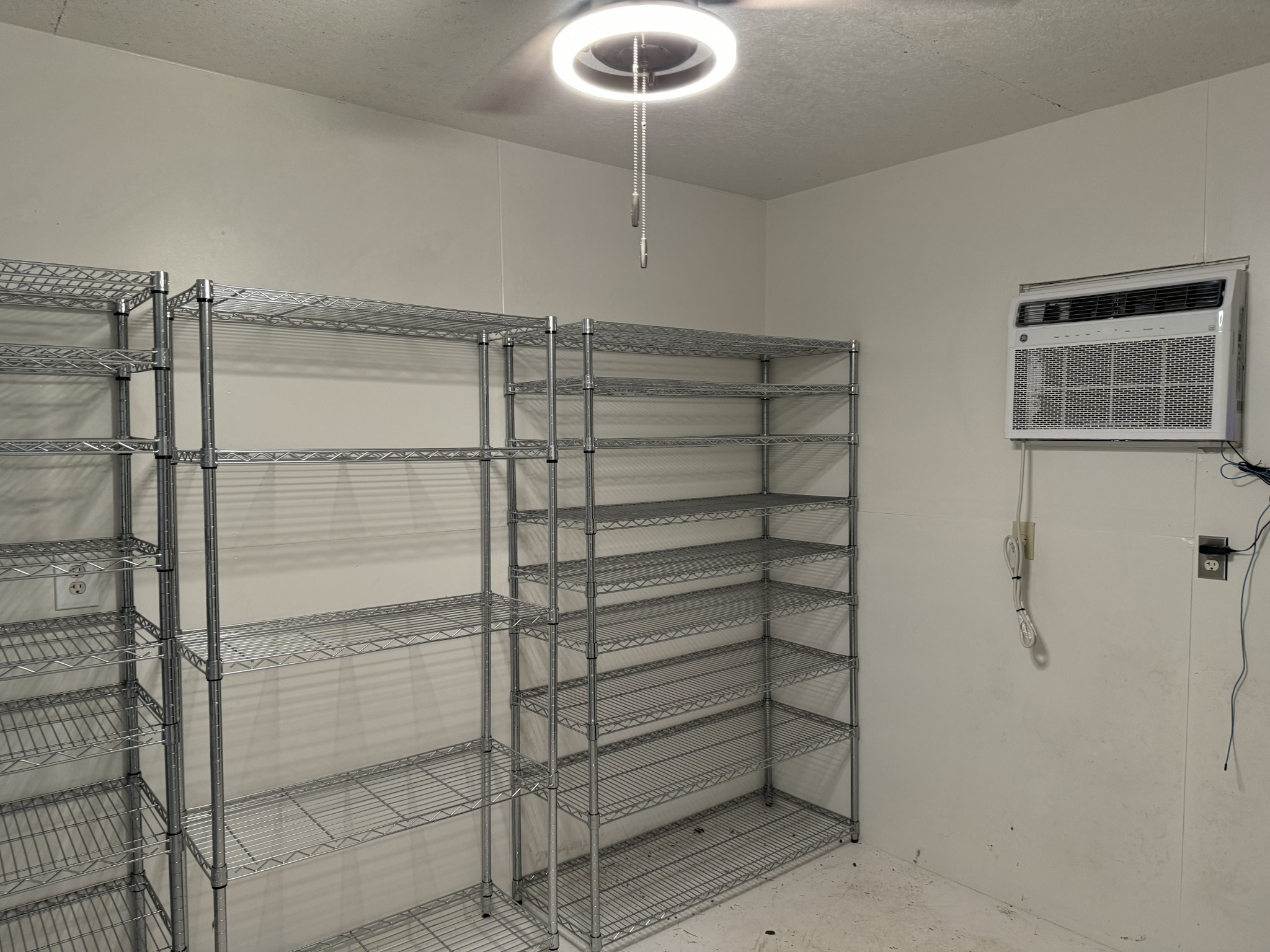 1792 Austin Road Lafayette, TN 37083 - Photo 20 of 34 a room with racks on the wall