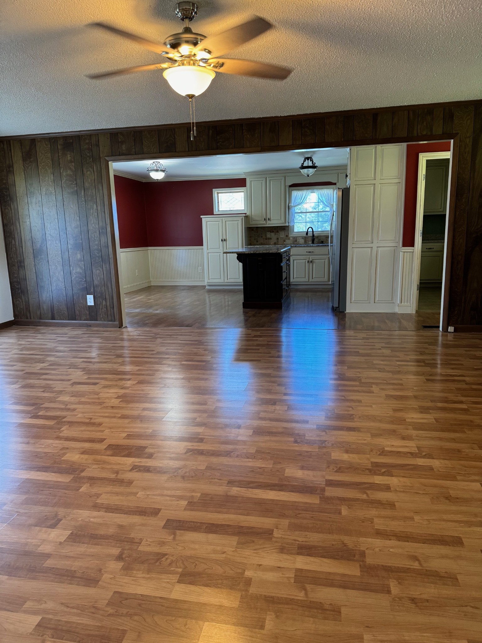 1792 Austin Road Lafayette, TN 37083 - Photo 10 of 34 a view of kitchen and dining room with wooden floor