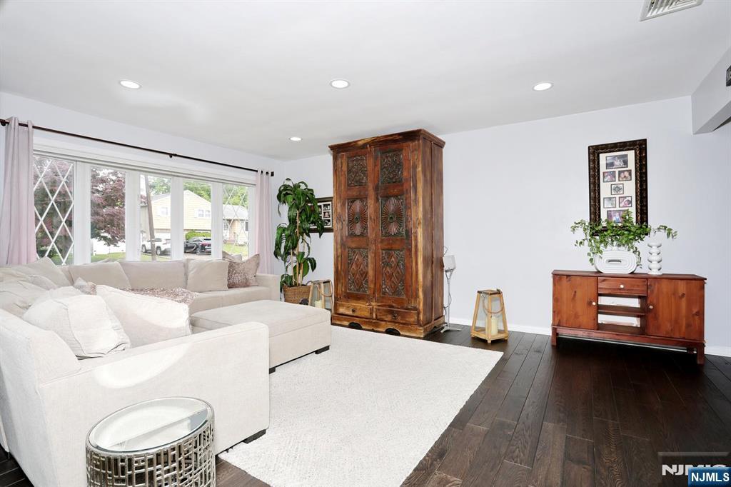 30 Brookfield Road Dumont, NJ 07628 - Photo 5 of 50 a living room with furniture and a large window