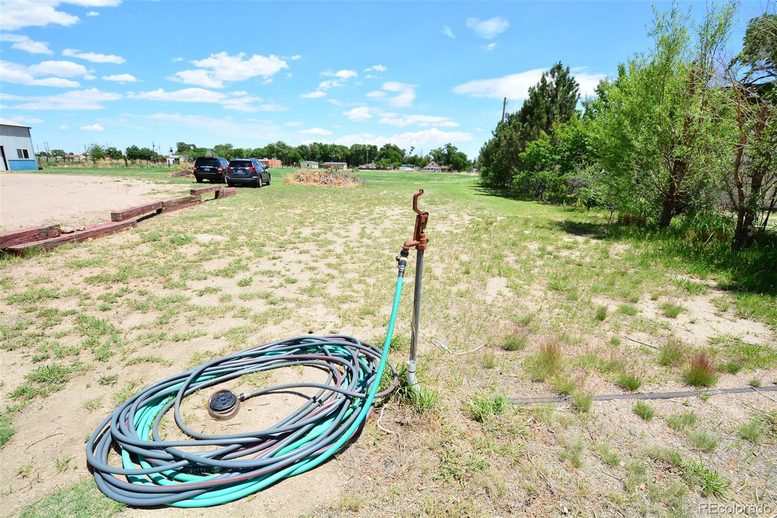 30640 Aldred Road Pueblo, CO 81006 - Photo 8 of 34 a view of a swimming pool with a yard